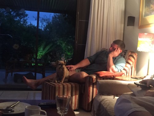 Enjoying some tickles and love from my Dad in front of TV